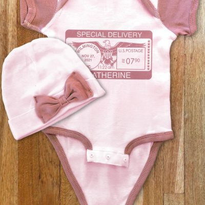 Onesie and hat combo in mauve and rose colors. Perfect gift for baby through toddler.